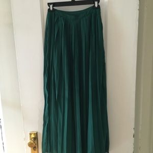 Green pleated skirt